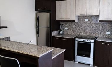 Casa de 3 dormitorios mas suite en el tercer piso con acceso independiente en el centro de Baños 2 parqueaderos