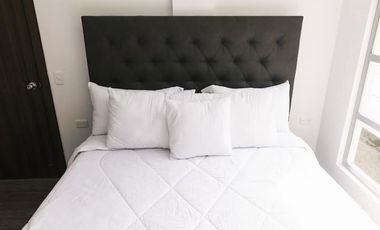 Casa de 3 dormitorios mas suite en el tercer piso con acceso independiente en el centro de Baños 2 parqueaderos