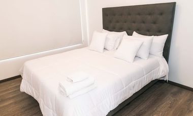 Casa de 3 dormitorios mas suite en el tercer piso con acceso independiente en el centro de Baños 2 parqueaderos