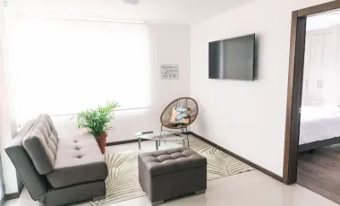 Casa de 3 dormitorios mas suite en el tercer piso con acceso independiente en el centro de Baños 2 parqueaderos