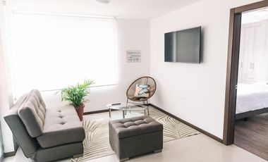 Casa de 3 dormitorios mas suite en el tercer piso con acceso independiente en el centro de Baños 2 parqueaderos