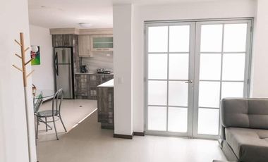 Casa de 3 dormitorios mas suite en el tercer piso con acceso independiente en el centro de Baños 2 parqueaderos