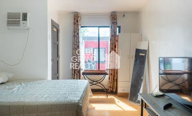 Bright Affordable Studio Featuring Cozy and Functional Comforts