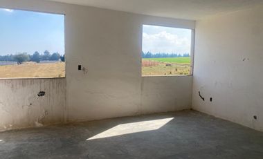 VENTA DE AMPLIO TERRENO CON CONTRUCCION SIN TERMINAR