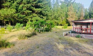 TERRENO AGRÍCOLA CON DOS CASAS 9.500 mt2 EN $80.000.000.-