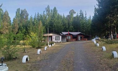TERRENO AGRÍCOLA CON DOS CASAS 9.500 mt2 EN $80.000.000.-