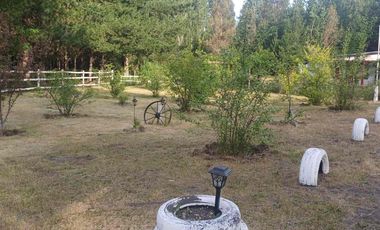 TERRENO AGRÍCOLA CON DOS CASAS 9.500 mt2 EN $80.000.000.-