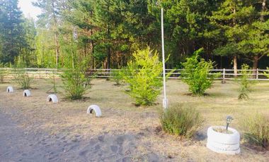 TERRENO AGRÍCOLA CON DOS CASAS 9.500 mt2 EN $80.000.000.-