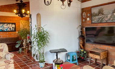 Extraordinaria casa campestre con piscina en un solo nivel en Campiñas de Combia Condominio Campestre. Pereira - Colombia.