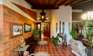 Extraordinaria casa campestre con piscina en un solo nivel en Campiñas de Combia Condominio Campestre. Pereira - Colombia.