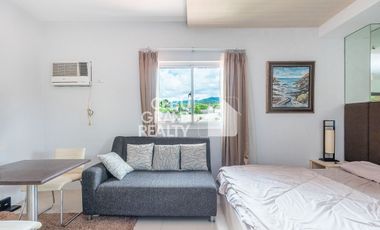 Breezy Mornings and Sparkling City Lights in a Cozy Studio Gem