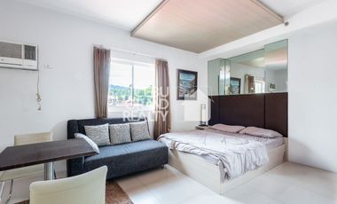 Breezy Mornings and Sparkling City Lights in a Cozy Studio Gem