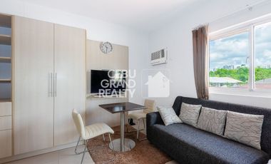 Breezy Mornings and Sparkling City Lights in a Cozy Studio Gem