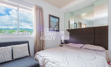 Breezy Mornings and Sparkling City Lights in a Cozy Studio Gem