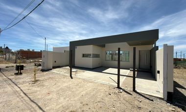 Casa en venta de dos dormitorios en Puerto Madryn a estrenar Dormitorio principal con baño en suite