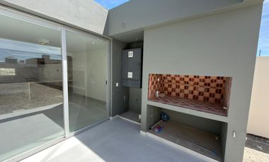 Casa en venta de dos dormitorios en Puerto Madryn a estrenar Dormitorio principal con baño en suite