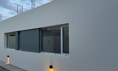 Casa en venta de dos dormitorios en Puerto Madryn a estrenar Dormitorio principal con baño en suite