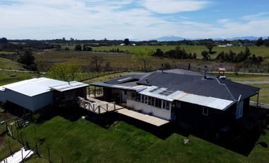 Campo con excelente acceso, conectividad e infraestructura productiva en Ilque - Puerto Montt