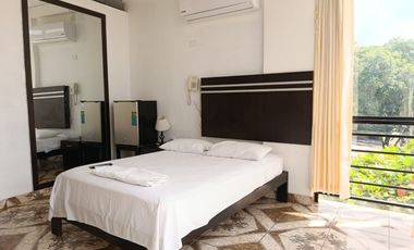 Edificio de 8 años en gran ubicación: Hospedaje operativo, local comercial y estacionamiento privado.