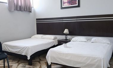 Edificio de 8 años en gran ubicación: Hospedaje operativo, local comercial y estacionamiento privado.