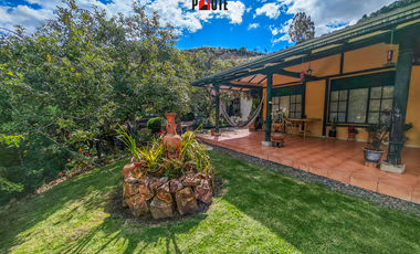 Propiedad campestre en Paute con 4 habitaciones y grandes áreas verdes