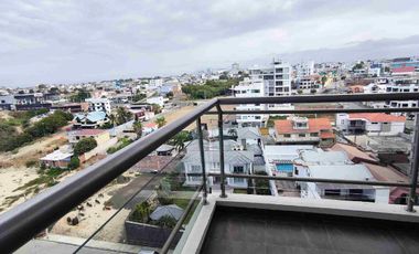 rento departamento en edificio frente al mar