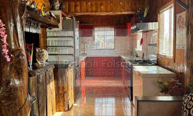 Casa de Tres niveles. Destacando la calidez y belleza de la madera del Sur