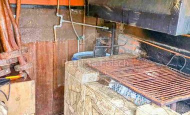 Casa de Tres niveles. Destacando la calidez y belleza de la madera del Sur