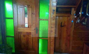 Casa de Tres niveles. Destacando la calidez y belleza de la madera del Sur