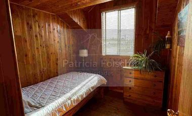 Casa de Tres niveles. Destacando la calidez y belleza de la madera del Sur