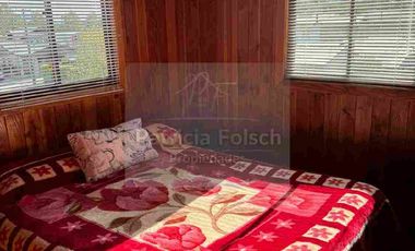 Casa de Tres niveles. Destacando la calidez y belleza de la madera del Sur