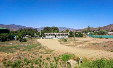 Leon Propiedades vende parcela con casa en zona comercial, sector El Ajial, Curacaví.