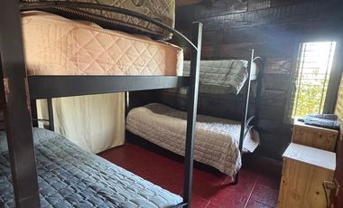 CABAÑA AMOBLADA DE TRONCO, 2 DORMITIRIOS, COCHERA X2, PILETA. ESCRITURA.POTRERO DE GARAY, Bº DEL LAGO. ESCRITURA