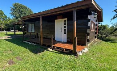 CABAÑA AMOBLADA DE TRONCO, 2 DORMITIRIOS, COCHERA X2, PILETA. ESCRITURA.POTRERO DE GARAY, Bº DEL LAGO. ESCRITURA