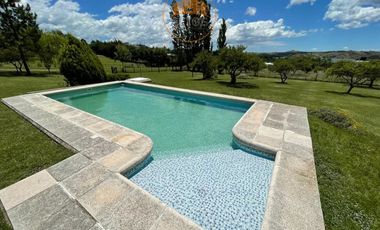 CASA CON PILETA EN TERRENO ESQ 3.000M2-BARRIO RESIDENCIAL-POTRERO DE GARAY-CORDOBA-ESCRITURA