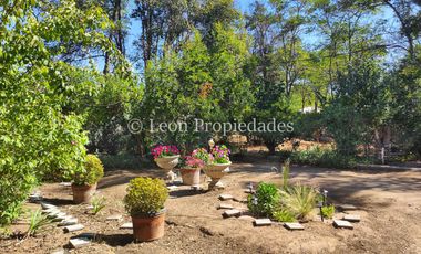 Leon Propiedades venda Gran sitio con casa en Avenida O’Higgins, Curacaví centro.