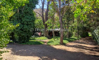 Leon Propiedades venda Gran sitio con casa en Avenida O’Higgins, Curacaví centro.