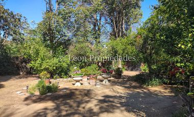 Leon Propiedades venda Gran sitio con casa en Avenida O’Higgins, Curacaví centro.