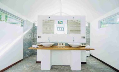 EXCLUSIVE BEACHFRONT RESORT