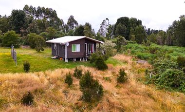 Venta Parcela con 2 Cabañas y Vista al Mar – Panitao, Puerto Montt