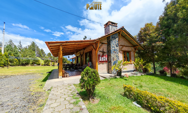 Propiedad en venta en Guachapala con amplio terreno y casa de campo