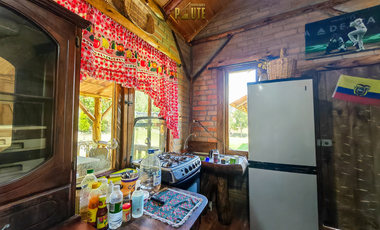 Propiedad en venta en Guachapala con amplio terreno y casa de campo