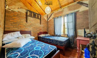 Propiedad en venta en Guachapala con amplio terreno y casa de campo