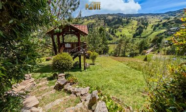 Propiedad en venta en Guachapala con amplio terreno y casa de campo