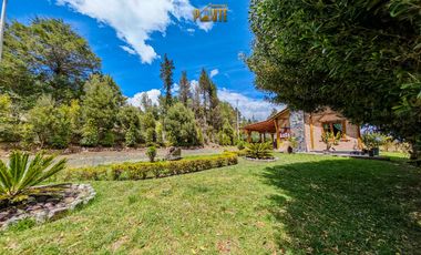 Propiedad en venta en Guachapala con amplio terreno y casa de campo