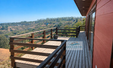 Casa en condominio con vista despejada, terrazas y 3 dormitorios