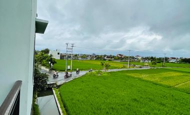Rumah modern minimalis pinggir jalan view sawah di kota Mataram