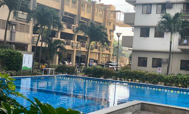 2BR CONDO W BAR&BALCONY OVERLOOKING MCKINLEY