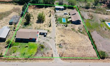 SE VENDE PROPIEDAD CON 2 CASAS EN SANTA RITA, PELARCO.