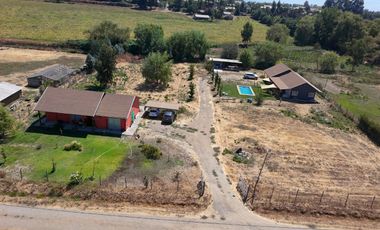 SE VENDE PROPIEDAD CON 2 CASAS EN SANTA RITA, PELARCO.